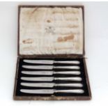 A cased set of 6 silver handled butter knives  CONDITION: Please Note -  we do not make reference to