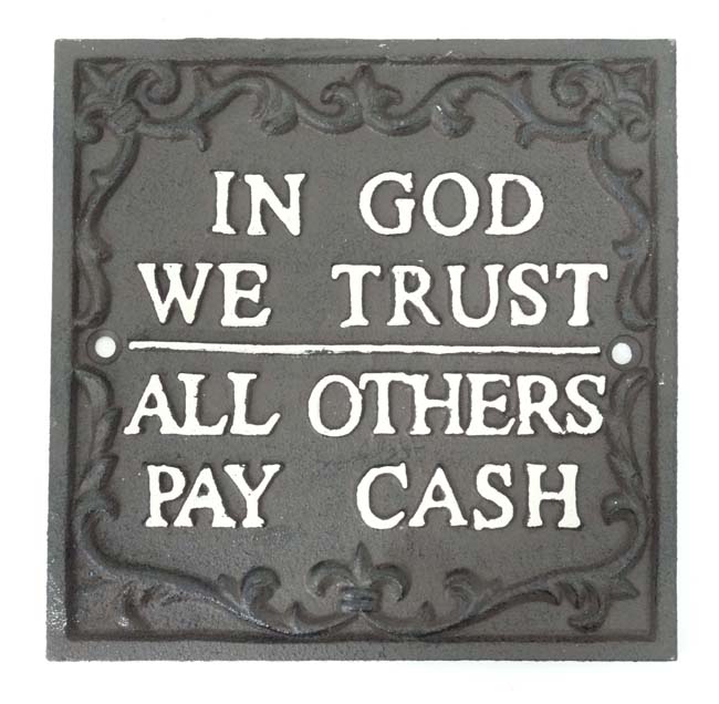 A cast sign "In god we trust" CONDITION: Please Note -  we do not make reference to the condition of
