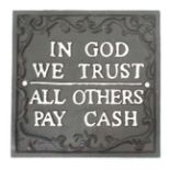 A cast sign "In god we trust" CONDITION: Please Note -  we do not make reference to the condition of