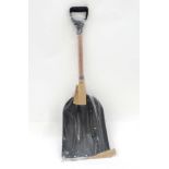 A large snow shovel with steel tip CONDITION: Please Note -  we do not make reference to the