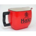 Advertising : A brass Clanroy Whiskey ash tray, a Haig Scotch Whiskey water jug together with a