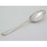 A silver Hanoverian pattern dessert spoon with rat tail to bowl. Hallmarked London 1938 . 6 3/4"