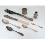 Assorted hallmarked silver and white metal items to include a teaspoon, napkin ring etc and an