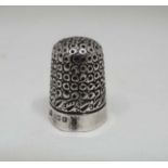 A silver thimble hallmarked.  Birmingham 1900 maker J.F  CONDITION: Please Note -  we do not make
