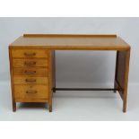 Vintage Retro : a British Oak 5 drawer desk with faux leather insert to top.47 1/2" wide. CONDITION: