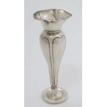 An early 20thC Art Nouveau hallmarked silver bud vase by Henry Matthews, Birmingham. 5" high