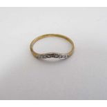 A 9ct gold ring with single chip set diamond in a wish bone setting  CONDITION: Please Note -  we do