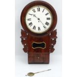 Fusee Drop Dial : A Mahogany cased 12" dial chisel point wall clock with carved vine leaf and