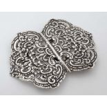 A silver 2-part belt buckle with foliate and C-scroll decoration Hallmarked Chester 1898 maker