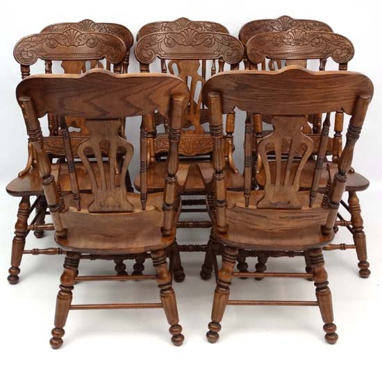 A late 20thC American style twin pedestal extending oak D-ended dining table having 2+6 chairs ( the - Image 2 of 7