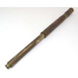 Militaria : An unsigned 19thC single - draw Naval telescope , of brass and copper construction .