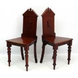 A pair of 19thC mahogany hall chairs 36 1/2" high  CONDITION: Please Note -  we do not make