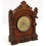 American clock : a c. 1900 oak cased Ansonia 8 day clock striking on a gong with sprung movement ,