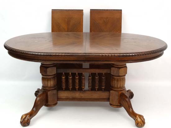 A late 20thC American style twin pedestal extending oak D-ended dining table having 2+6 chairs ( the - Image 4 of 7
