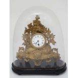 Gilt clock under glass dome :  a 19 thC gilt painted spelter timepiece clock, depicting a French