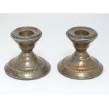 A pair of American short candlesticks maker S.S Co. 2 1/2" high  CONDITION: Please Note -  we do not