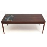 Vintage Retro : A Danish rosewood? Coffee table with 6 inset tiles to one end, standing on four