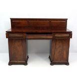 A William IV mahogany pedestal sideboard with three raised panel back  61 3/4" wide x 19 3/4" deep x