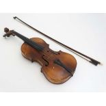 Musical Instruments : An early to mid 20thC violin , bears label within for ' J D  Bevan ' and