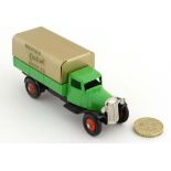 A Dinky Meccano Toy lorry 25b, with rear hook , having green body , '' Castrol Motor Oil '' gold tin