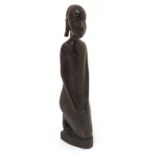 Ethnographica :  An African Native tribal figure of a kneeling woman 11" high  CONDITION: Please