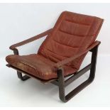 Vintage Retro : A Danish Leather reclining lounge chair with adjustable seat and open strap