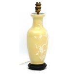 A Chinese ceramic vase formed table lamp with decorated yellow celadon like glaze 13 1/2" high