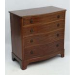 A mid 20thC mahogany serpentine shaped set of 4 graduated long drawers with canted corners and