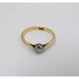 An 18ct gold ring set with solitaire diamond.  CONDITION: Please Note -  we do not make reference to