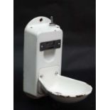 Vintage Retro : a British Novus white enamelled wall mounted drinking fountain, labelled.16" high.