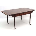 Manner of Gillows ; A mahogany cross banded table ( sofa table like) having 2 frieze drawers and 2