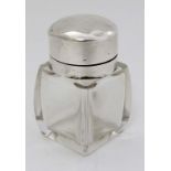 A glass salts bottle with silver mounts and hinged lid. Hallmarked Birmingham 1921 maker Deakin &