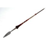 Ethnographica Native Tribal : An Anaga / Anaya? head hunters spear, the wooden shaft carved with red