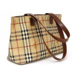 A Genuine Ladies Burberry London Nova check handbag, having 1 inside pocket with zip and grey /