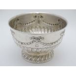 A silver pedestal rose bowl with bow, harebell and swag decoration . Hallmarked London c.1904