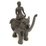 Ethnographica : A carved Indian wooden depiction of an elephant and mahout to top . Approx 12 1/2"
