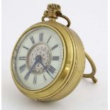 Large Easel / Strutt clock : a brass cased timepiece of pocket watch form with bevelled glass ,