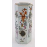 A Chinese hand painted famille rose hexagonal vase decorated with figures, bears red Chinese seal