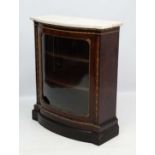 A 19thC walnut bow front pier cabinet with white marble top and gold detailing. 33" wide x 40 1/4"