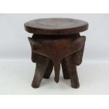 An unusual early - mid 20thC carved tree root table in the form of an African elephant 21 1/2"