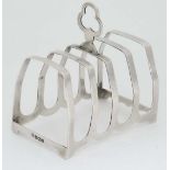 A small 5-bar silver toast rack. Hallmarked Sheffield 1948 maker Cooper Brothers & Sons Ltd. 2 3/