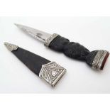 Militaria : A mid 20thC Sgian Dubh / Skean Dhu , the 3 5/8" blade having single fuller and nine