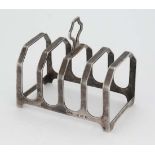 A 5-bar silver toast rack hallmarked Birmingham 1933 maker Marson & Jones. 32 long x 2 1/2" high (