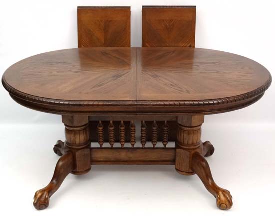 A late 20thC American style twin pedestal extending oak D-ended dining table having 2+6 chairs ( the - Image 3 of 7