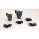Vintage Retro : an English Poole pottery coffee set comprising of a coffee pot, milk jug and 4
