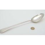 A silver Old English pattern silver stuffing / basting spoon. Hallmarked London 1825 maker Charles