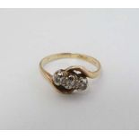 A yellow metal ring set with trio of diamonds to top CONDITION: Please Note -  we do not make