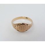 A 9ct gold signet ring (2.5g) CONDITION: Please Note -  we do not make reference to the condition of