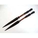 Native Tribal  : a pair of African carved wooden short spears.
 CONDITION: Please Note -  we do