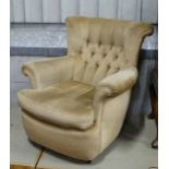 Tub chair with gold coloured upholstery  CONDITION: Please Note -  we do not make reference to the